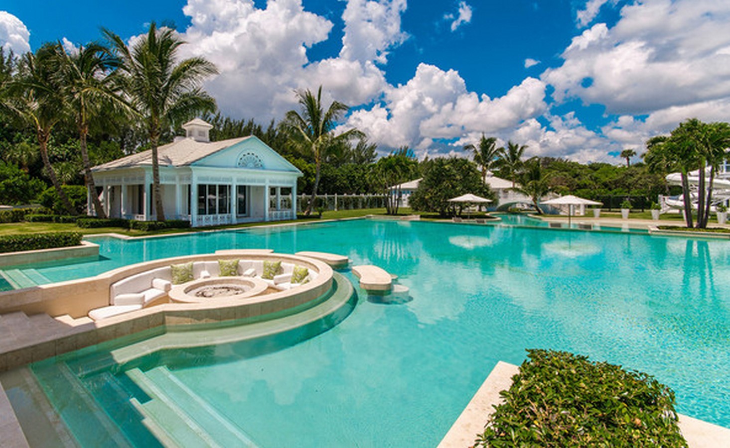 Classic mansion-style swimming pool with grand surroundings